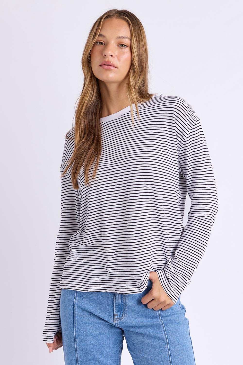 Model Genericm wearing size sample of the Elements Hutch Stripe Cotton Long Sleeve Tee - Whiteblack in colour Whiteblack, in a cropped view