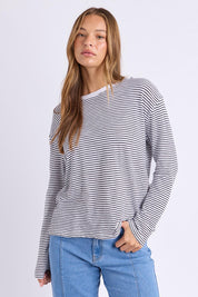 Model Genericm wearing size sample of the Elements Hutch Stripe Cotton Long Sleeve Tee - Whiteblack in colour Whiteblack, in a cropped view