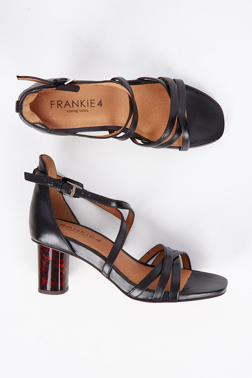 A model wearing size 7 of the Abi Leather Heel in colour Black (Black), from the front, showing the whole outfit