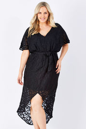 Model Jess wearing size 12 of the Maylou Tie Waist Maxi Dress in colour BlackAntiq (Black), from the front, cropped image