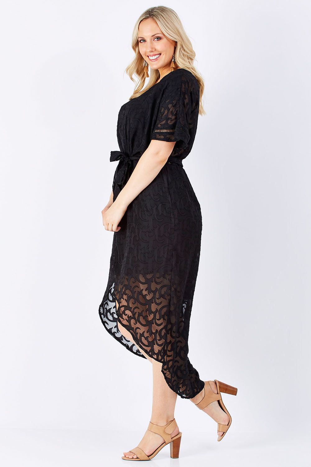 Model Jess wearing size 12 of the Maylou Tie Waist Maxi Dress in colour BlackAntiq (Black), from the front, showing the whole outfit