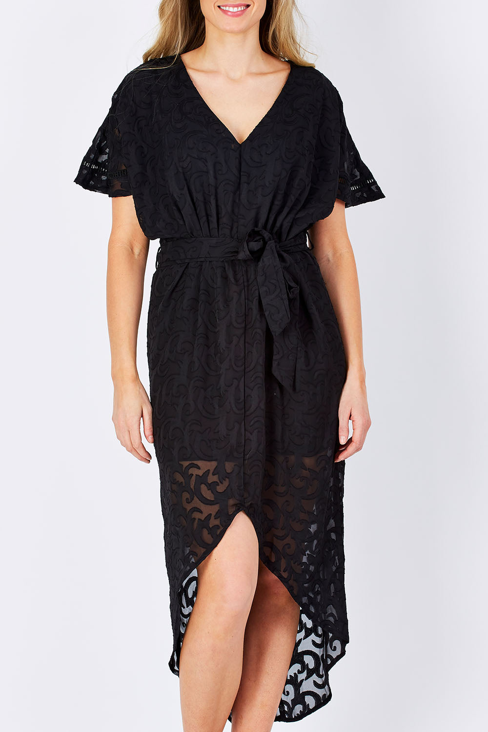 Model Maddy wearing size 10 of the Maylou Tie Waist Maxi Dress in colour BlackAntiq (Black), from the front, cropped image