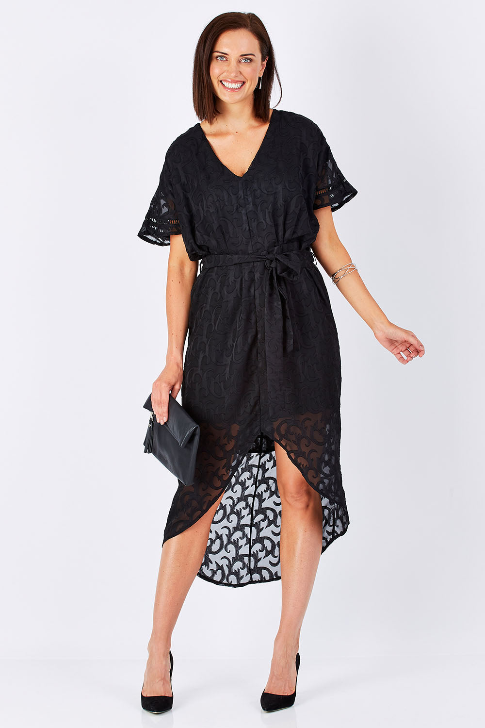Model Perrie wearing size 10 of the Maylou Tie Waist Maxi Dress in colour BlackAntiq (Black), from the front, showing the whole outfit