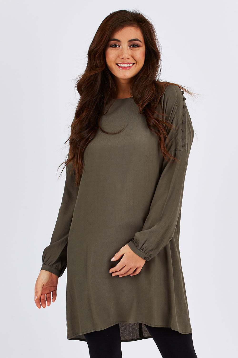 Model Chesska wearing size 10 of the Flora Buttoned Sleeve Dress in colour Khaki (Green), from the front, cropped image