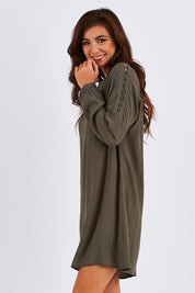 Model Chesska wearing size 10 of the Flora Buttoned Sleeve Dress in colour Khaki (Green)