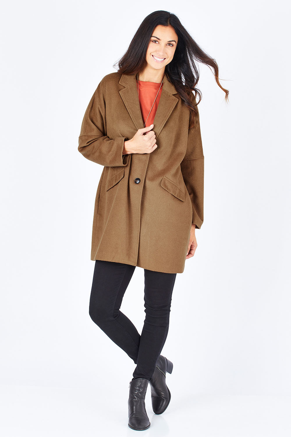 Model Gemma wearing size S of the Ascot Coat in colour Caramel, from the front, showing the whole outfit