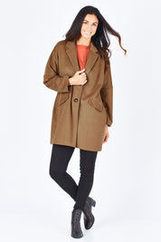 Model Gemma wearing size S of the Ascot Coat in colour Caramel, from the front, showing the whole outfit