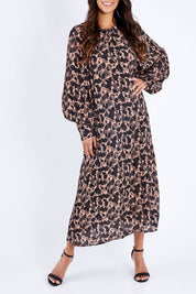Model Vitoria wearing size 10 of the Bound For Glory Dress in colour Abstractan (Black), from the front, cropped image