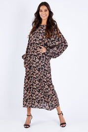 Model Vitoria wearing size 10 of the Bound For Glory Dress in colour Abstractan (Black), from the front, showing the whole outfit