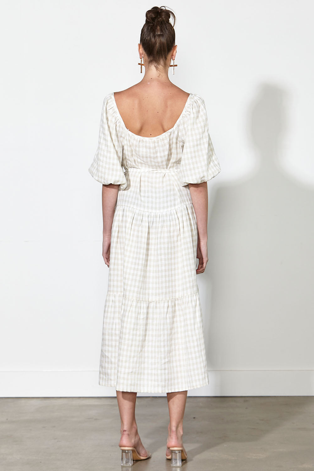 A model wearing the Soul Love Linen Dress in colour Boneging, from the back