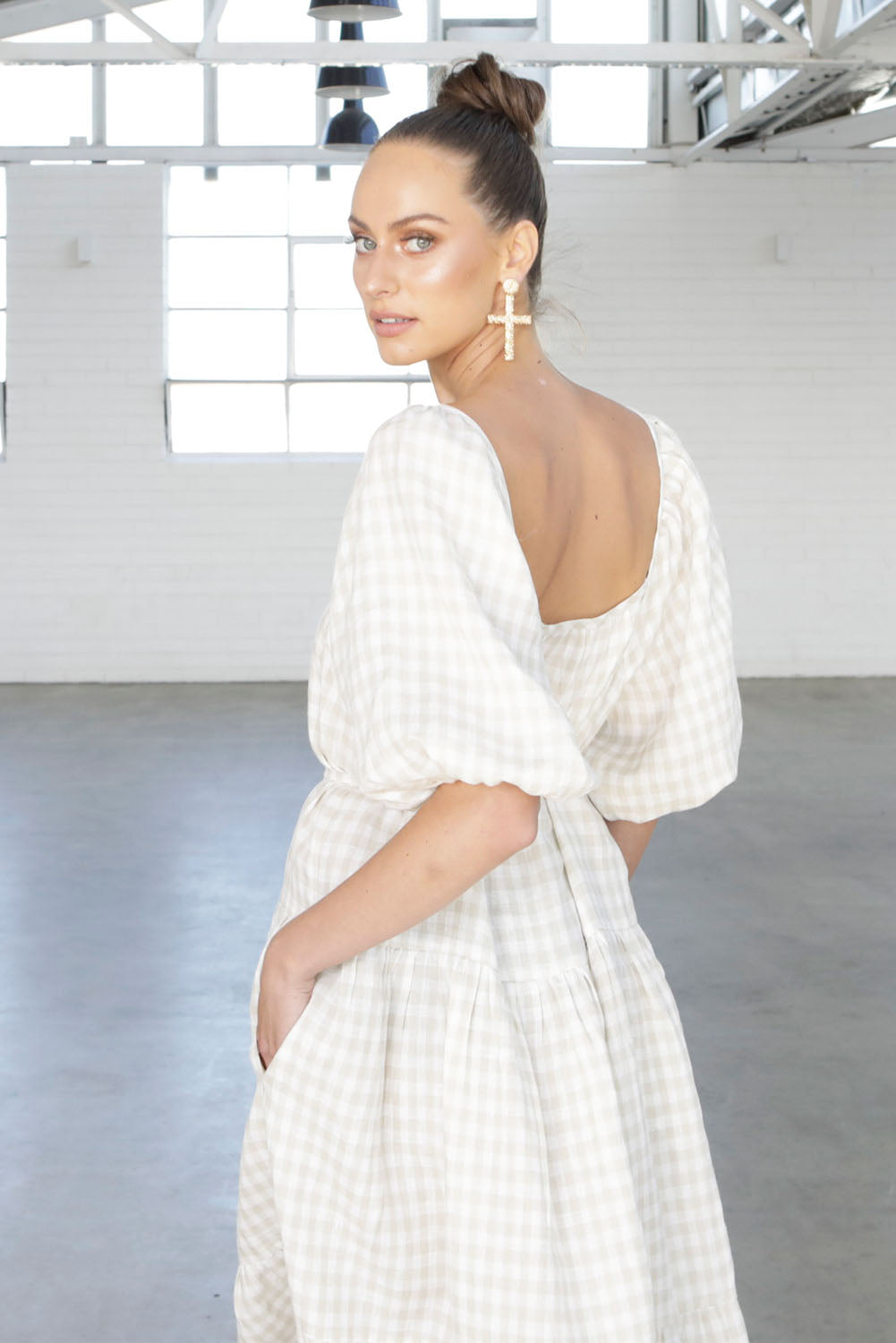 A model wearing the Soul Love Linen Dress in colour Boneging, from the front, showing the whole outfit