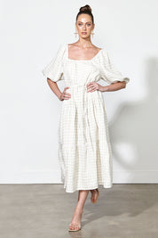 A model wearing the Soul Love Linen Dress in colour Boneging, from the front, showing the whole outfit