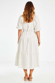 Model Laura wearing size 14 of the Soul Love Linen Dress in colour Boneging, from the back