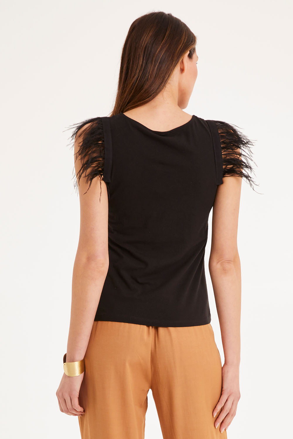 Model Madeline wearing size 10 of the Enchanted Top in colour Black (Black), from the back