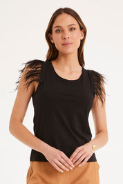 Model Madeline wearing size 10 of the Enchanted Top in colour Black (Black), from the front, cropped image