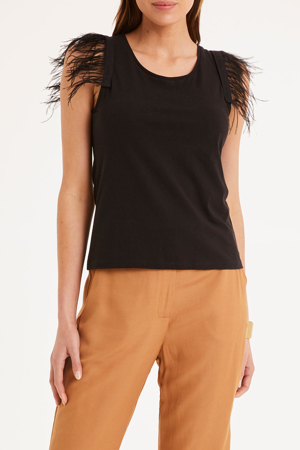 Model Madeline wearing size 10 of the Enchanted Top in colour Black (Black), from the front, cropped image