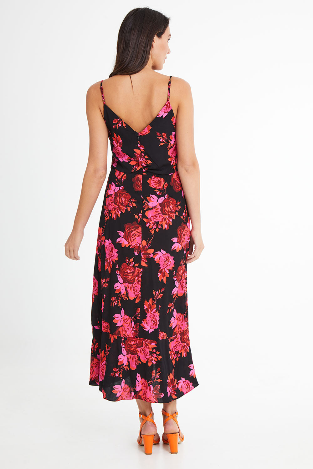 Model Madeline wearing size 10 of the Walk Away Dress in colour Punchflora (Black), from the back