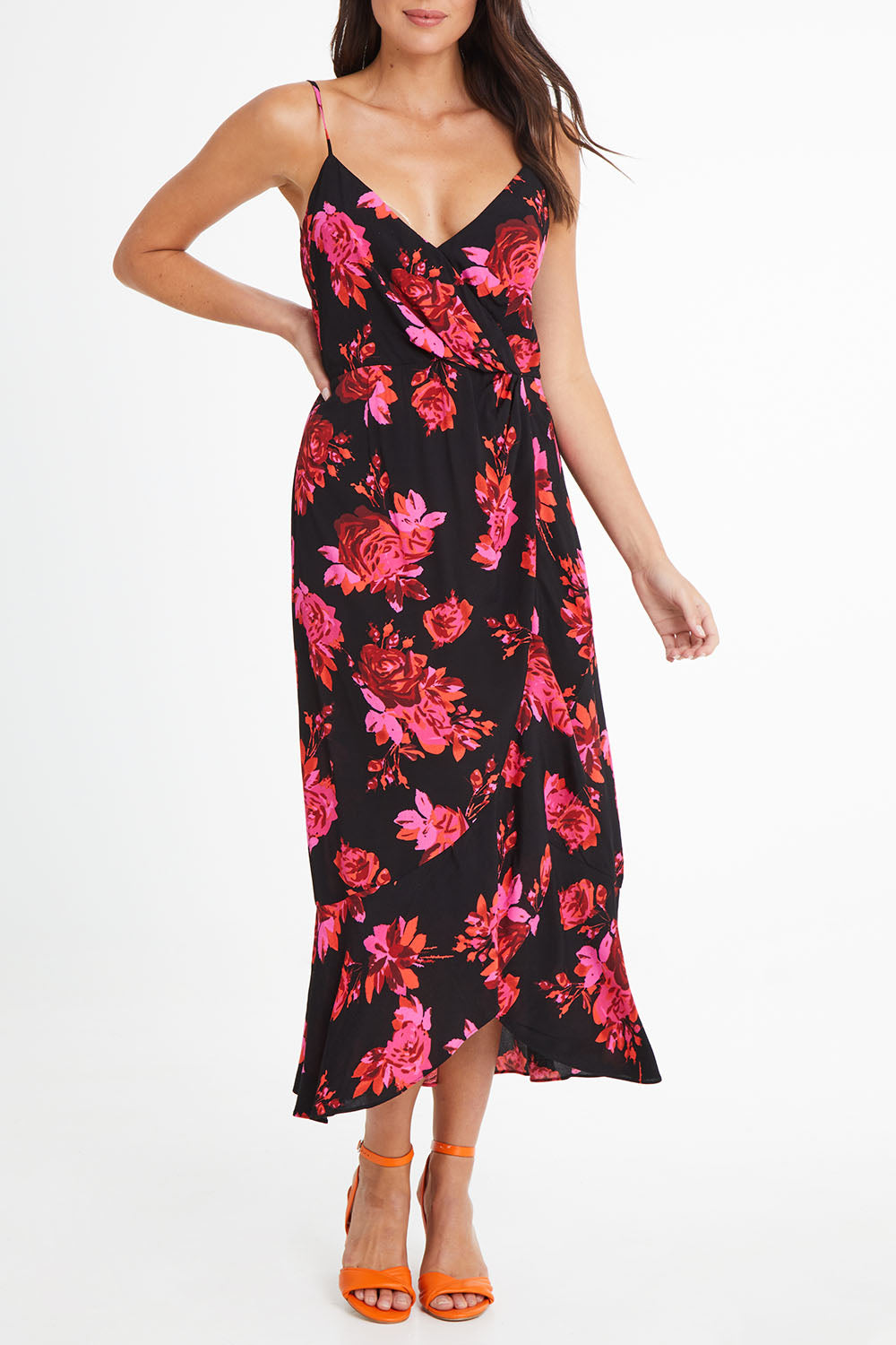 Model Madeline wearing size 10 of the Walk Away Dress in colour Punchflora (Black), from the front, cropped image