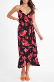 Model Madeline wearing size 10 of the Walk Away Dress in colour Punchflora (Black), from the front, cropped image