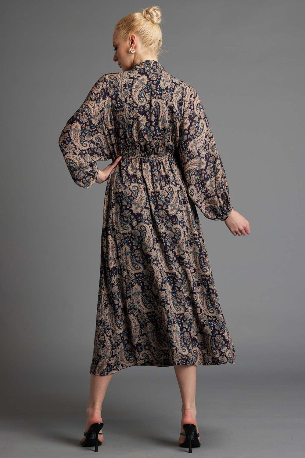A model wearing the Nightfever Bohemian Maxi Dress in colour Navy (Blue), from the back