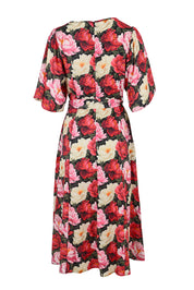 Product shot of the Lyrical Lyocell Midi Dress in colour Oscarflora (Pink), from the back