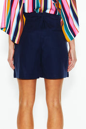 A model wearing the Lyrical Lyocell Blend Short in colour Navy (Blue), from the back