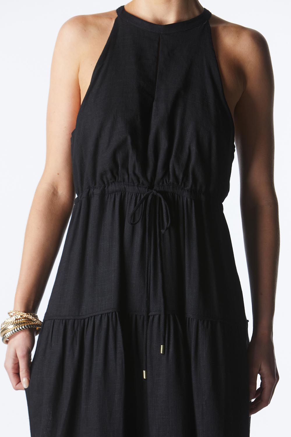 A model wearing the Midsummer Halter Linen Blend Maxi Dress in colour Black (Black), from the front, cropped image