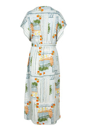 Product shot of The Terrace Linen Cotton Dress in colour Postcard (Blue), from the back