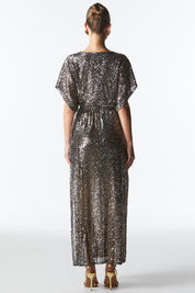 A model wearing the Impression Sequin Dress in colour Gunmetal (Black), from the back