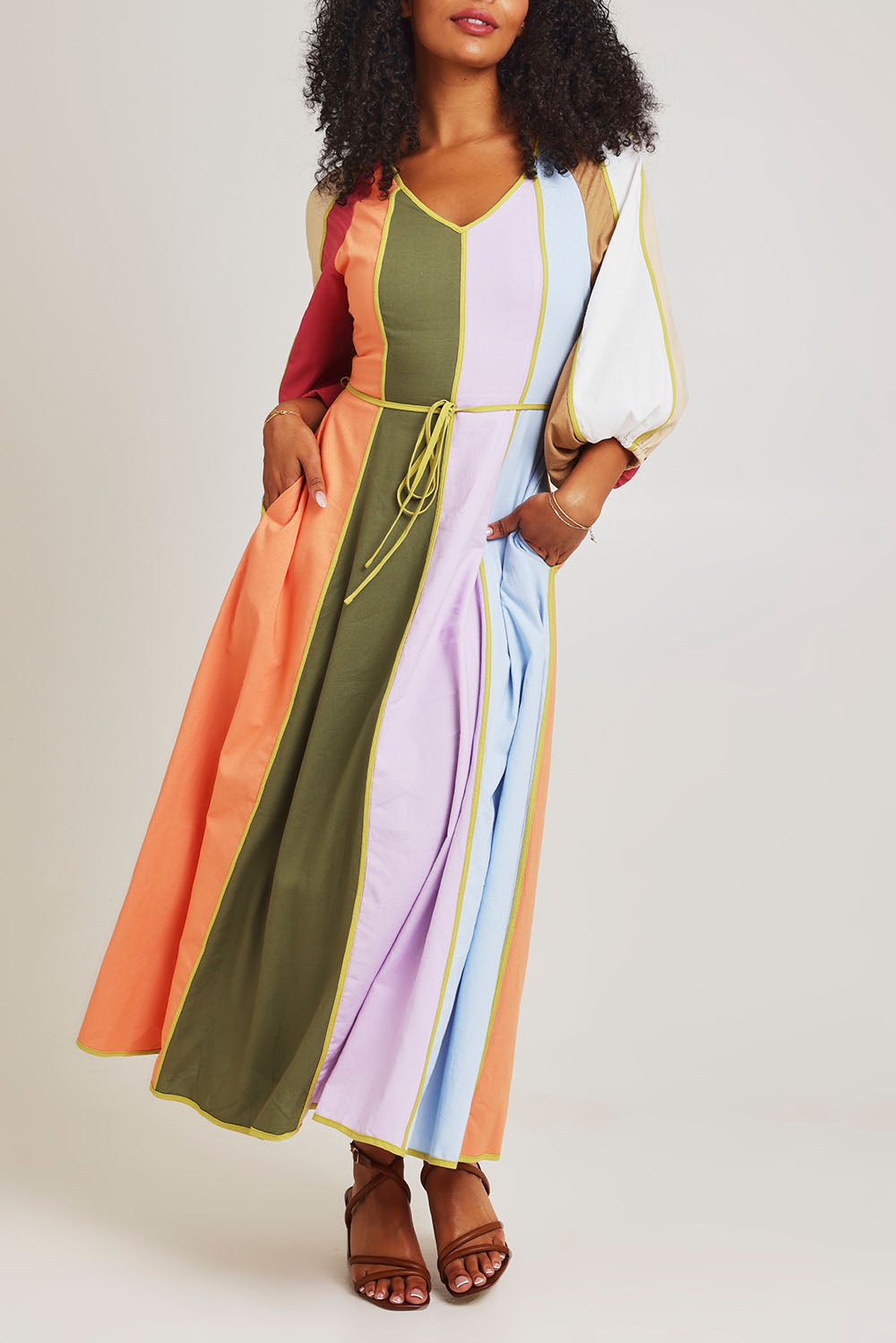 Model Ziara wearing size 10 of the Sun Jewel Linen Blend Dress in colour Multi, from the front, cropped image