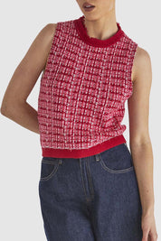 A model wearing the Kinetic Cotton Blend Knit Top in colour Pink (Pink), from the front, cropped image