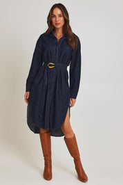 Model Madeline wearing size 10 of the Soaring Denim Shirt Dress in colour Indigo (Blue), from the front, showing the whole outfit