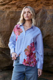 A model wearing the Sweet Jane Cotton Shirt in colour Stripe (Blue), from the front, showing the whole outfit