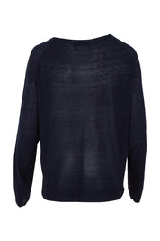 Product shot of the Reminiscent Knit Top in colour Navy (Blue), from the back