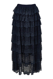 Product shot of the Domino Maxi Skirt in colour Navy (Blue), from the front