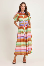 Model Madeline wearing size 10 of the Siesta Lyocell Blend Dress in colour Stripe, from the front, showing the whole outfit