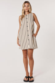 A model wearing the Luna Cotton Blend Dress in colour Creamblack, from the front, showing the whole outfit