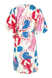Product shot of the Soleil Wrap Dress in colour Lobster, from the back