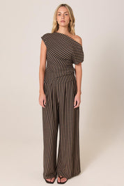 A model wearing the Everlyn Jersey Pant in colour Multi, from the front, showing the whole outfit