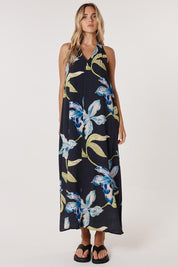 A model wearing the Anthea Linen Blend Maxi Dress in colour Blkfloral (Black), from the front, showing the whole outfit