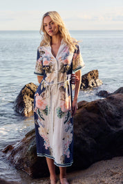A model wearing the Solara Linen Blend Shirt Dress in colour Navy (Blue), from the front, showing the whole outfit