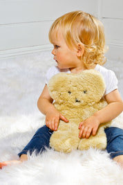 A model wearing the Flatout Bears in colour Honey, from the front, showing the whole outfit