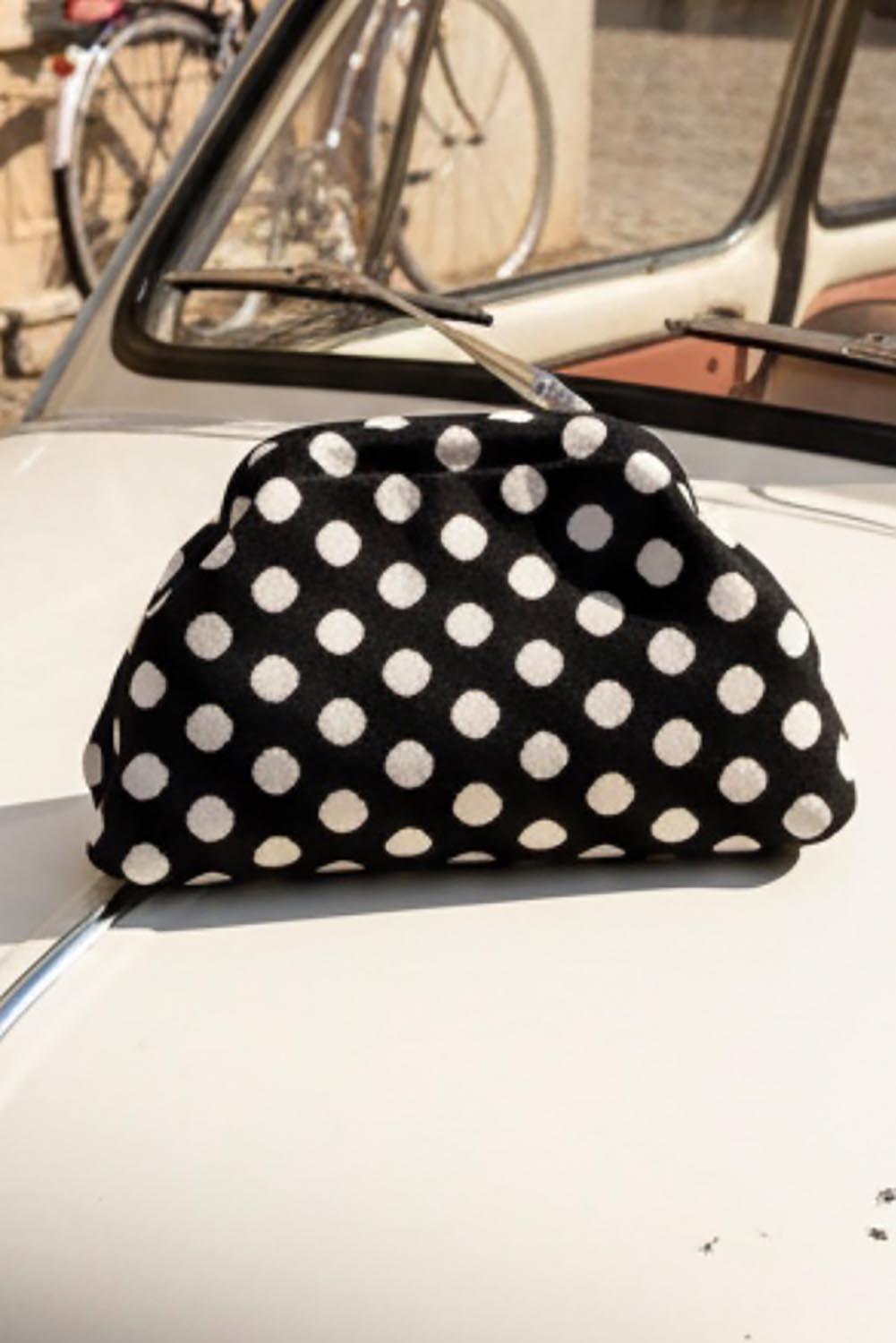 Product shot of the Bondi Spot Clutch - Blackwhite in colour Blackwhite, from the back