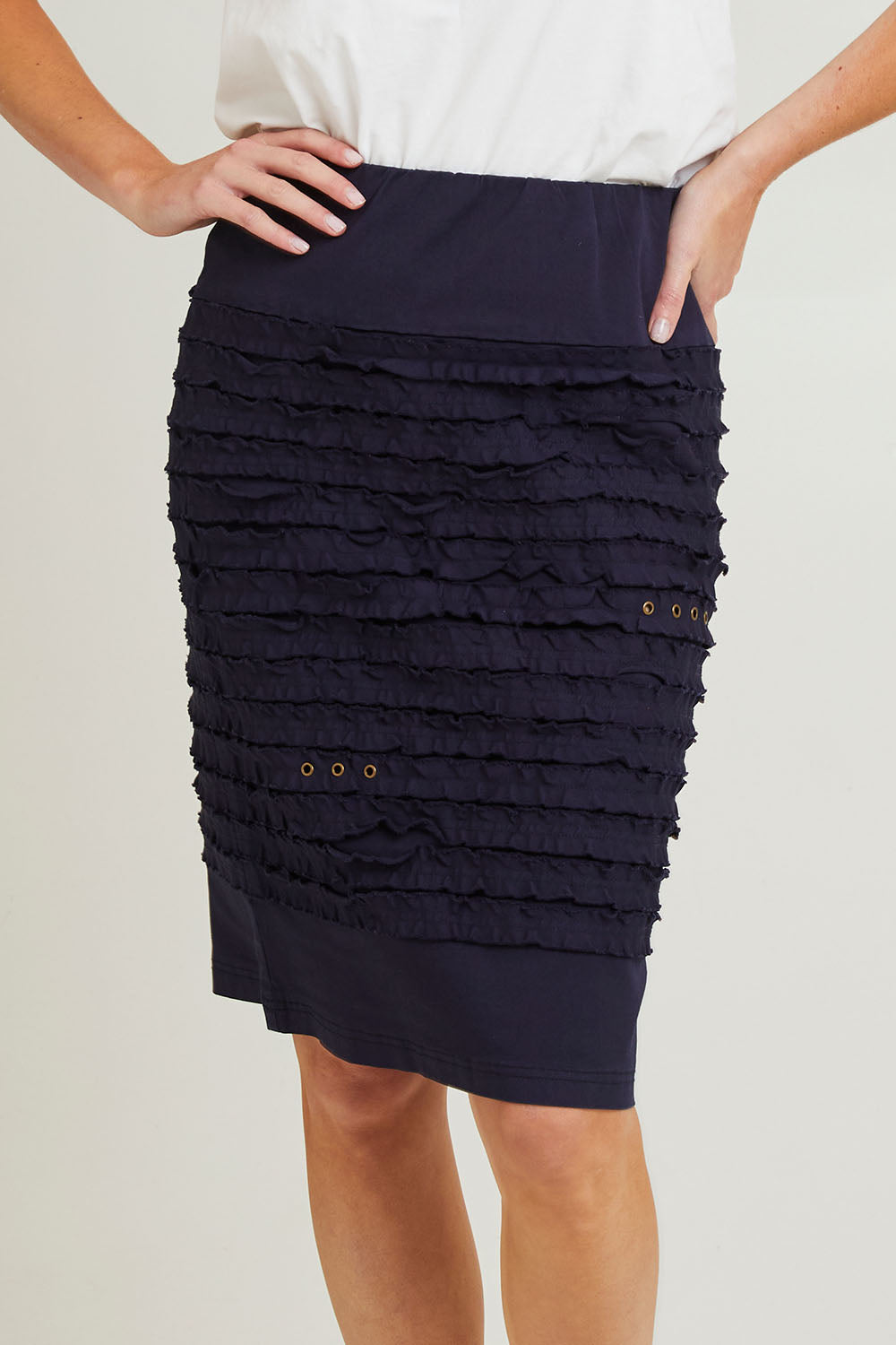 Model Grace wearing size 10 of the Cotton Twill Skirt in colour Navy (Blue), from the front, cropped image