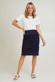 Model Grace wearing size 10 of the Cotton Twill Skirt in colour Navy (Blue), from the front, showing the whole outfit