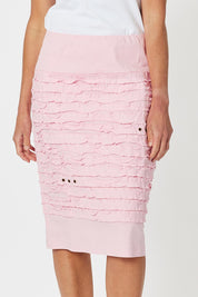 A model wearing the Cotton Twill Skirt in colour Pink (Pink), from the front, cropped image