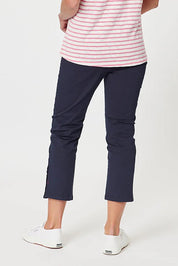 A model wearing the Cotton Twill Pant in colour Navy (Blue), from the back