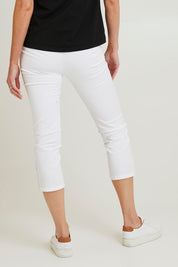 Model Grace wearing size 10 of the Cotton Twill Pant in colour White (White), from the back