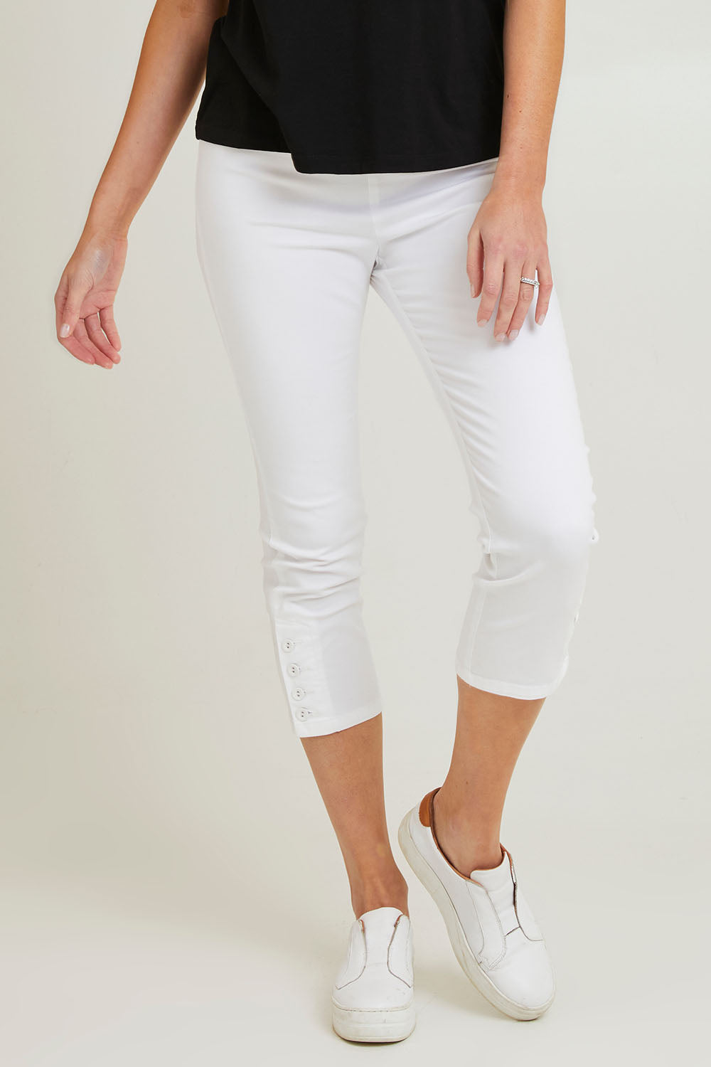 Model Grace wearing size 10 of the Cotton Twill Pant in colour White (White), from the front, cropped image