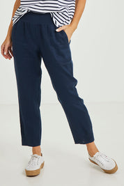 Model Luisa wearing size 10 of the Jersey Waist Linen Pant in colour Marine (Blue), from the front, cropped image